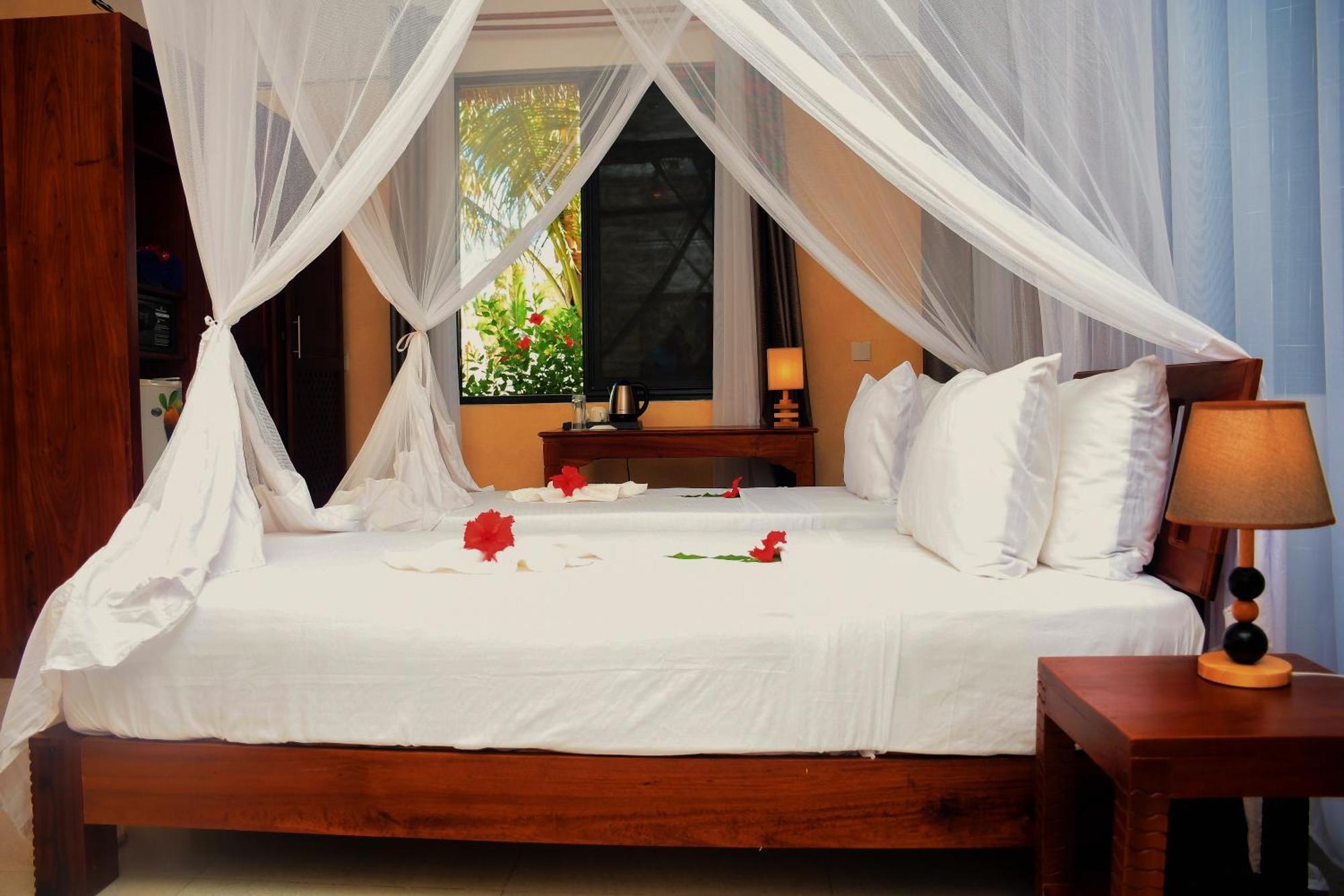 Manolo Beach Resort Ероа Экстерьер фото